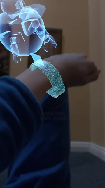 Preview for a Spotlight video that uses the HOLOGRAM WATCH Lens