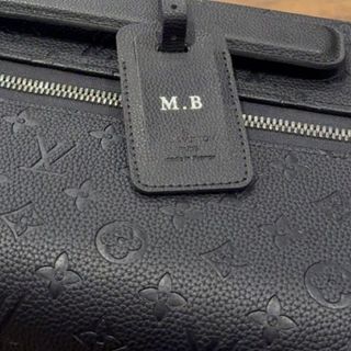 M B