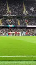 Watch Erling Haaland score a stunning goal for Manchester City at the Etihad Stadium. The video captures the moment he finishes the play, runs towards the corner flag in celebration, slides on his knees, and is mobbed by ecstatic teammates. The packed stadium erupts in cheers, showcasing the electric atmosphere of a live Premier League match. by @erling.haaland with Original Sound by erling.haaland
