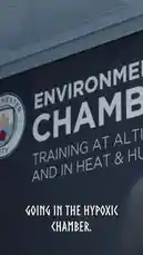 This behind-the-scenes look features Erling Haaland at Manchester City's training facility, demonstrating his use of the environmental chamber for altitude and heat training. The footage shows him preparing for and undergoing a session on a stationary bike within the hypoxic environment, providing insight into the physical and mental preparation of a top professional athlete. by @erling.haaland with Original Sound by erling.haaland