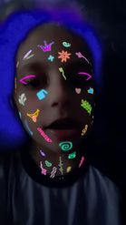 Preview for a Spotlight video that uses the Glowing Face Stickers Lens