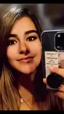 In this close-up shot, Krystal Samora holds up her phone to display a unique case she has created. The case features a printed design with handwritten text and a small photograph, suggesting a personal project or a DIY craft idea. This scene is ideal for viewers interested in creative expression through everyday objects. by @krystalleann32 with Sounds Like Something I’d Do by Drake Milligan