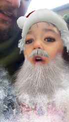 Preview for a Spotlight video that uses the Santa Claus Filter Lens