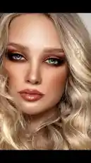 A captivating close-up portrait of a model showcasing a flawless golden-hour-inspired makeup look, featuring warm bronze eyeshadow, defined brows, and glossy nude lips. Her wavy blonde hair frames her face beautifully under soft, natural-looking lighting. The shot is static, emphasizing the artistry and detail of the makeup application by renowned artist aljawharah Artist 💄. by @aljawharah_art with original sound