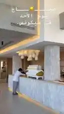 This video offers a glimpse into the stylish interior of Sequence Coffee, showcasing its modern design and inviting atmosphere. A barista is seen working diligently behind the counter, preparing drinks for customers. The café features sleek, textured columns and contemporary lighting fixtures, creating a sophisticated ambiance perfect for enjoying a coffee. The text overlay in Arabic highlights the café's location in Sikkon, adding a touch of local charm. by @sequence-coffee with ⋅˚₊‧ ୨୧ ‧₊˚ ⋅ by Contains: New Home - Austin Farwell