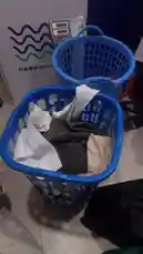 This short video provides a glimpse into EKO's daily life, starting with a scene in a laundry room filled with baskets of clothes and a digital scale. It then transitions to a nighttime street view where people are seen near a car with its trunk open, suggesting a possible errand or gathering. by @launderra with Original Sound by kweku_made
