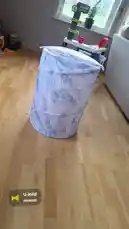 Watch Zagvik demonstrate a collapsible laundry hamper in action. This simple yet effective household item features a stylish blue and white patterned fabric cover that folds flat for easy storage. The video provides a clear look at its design and functionality, making it a useful reference for anyone looking for space-saving solutions. by @zagvik with Så deiligt by Pusseropp