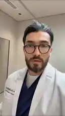 In a modern clinic setting, Dr. Mohammed Al-Marghoub, a plastic surgeon, provides a detailed comparison of two Polytech breast implant models. He holds up a 'Size 6' implant and then a 'Size 8' implant, showcasing their physical differences. The doctor points out specific features on the implants while explaining their characteristics, aiming to inform viewers about these cosmetic surgical options. by @dralmarghoub with Original Sound by dralmarghoub