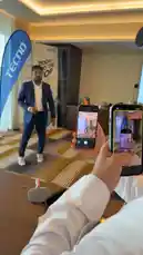 In this point-of-view tutorial, learn a pro technique for live streaming using two smartphones simultaneously. One phone captures the main feed while the other shows the live stream interface, all within a modern room setting. by @point_tech1 with Original Sound by point_tech1