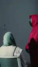 This promotional video introduces DirectLine digital business services. It begins with a dramatic scene inspired by 'Squid Game,' showing a person in a hijab being addressed by figures in red hooded suits. This powerful imagery transitions into a clear presentation of the company's branding, contact information, and office location, effectively capturing attention before delivering key details. by @directline with Original Sound by directline