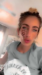 Preview for a Spotlight video that uses the Snake Tattoo Lens