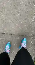 brattyluhbaby 님이 만든 Original Sound 포함 @brattyluhbaby 님이 만든 A point-of-view shot captures Baby 💫 walking confidently on a paved path while wearing bright blue roller skates with pink laces. The casual, stylish look is perfect for a day out, showcasing her unique footwear.