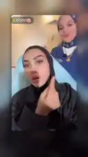 In this Bella Clinic beauty tutorial, two women discuss techniques for enhancing facial features. One woman, wearing a black hijab, points to her eye area while explaining how to define the 'teardrop' point and widen the appearance of the eyes. Her companion, in a blue hijab, listens and agrees. They share tips on making small eyes look larger, using hand gestures to demonstrate the areas being discussed. by @bellaclinickw with Original Sound by bellaclinickw