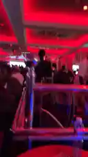 This clip captures the vibrant energy of a crowded nightclub, bathed in intense red light. A large screen displays the name 'GUVNOR,' which is also watermarked on the footage. The crowd is seen dancing enthusiastically to the music, creating a dynamic atmosphere. This visual is associated with the artist Gucci Outta Here. by @managergxcci with Original Sound by managergxcci