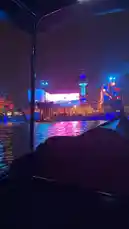 Experience the vibrant nightlife of Dubai from the water. This captivating night cruise offers stunning views of illuminated skyscrapers, a dazzling light show projected onto a large screen, and the serene beauty of the creek reflecting the city's colorful lights. by @guruofmarketing with Original Sound by guruofmarketing