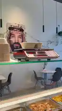 This video offers a behind-the-scenes look inside Proteinz, a healthy meal prep establishment. It features a digital scale ready for use, fresh food in stainless steel trays, and a modern interior design with a distinctive portrait on the wall. The scene captures the essence of a clean, organized, and health-focused dining or takeaway environment. by @proteinz_sa with Original Sound by proteinz_sa