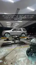 Witness a stunning car wash transformation in progress! A silver SUV gleams under bright lights while a motorcycle is meticulously cleaned with thick, luxurious foam. This high-quality detailing showcases professional techniques perfect for anyone seeking a showroom shine. by @wash.4drops with Original Sound by wash.4drops
