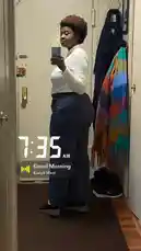 In this morning mirror selfie, Liyah captures her full outfit for the day. She's wearing a white long-sleeve top, dark wide-leg pants, and black sneakers. The time stamp reads 7:35 AM with the 'Good Morning' song by Kanye West playing, setting the tone for her day. by @dimpled.diva02 with Good Morning by Kanye West