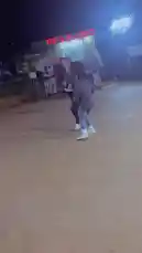 In this nighttime scene, two young men share a joyful dance before embracing in a heartfelt hug. The moment captures genuine friendship and celebration, filmed in front of a building with a bright 'JESUS IS LORD' sign. It's a candid, feel-good clip that embodies the spirit of connection and fun. by @managergxcci with Original Sound by managergxcci