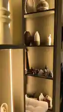 Discover elegant interior design concepts in this stylish tour of a modern home. Explore a chic walk-in closet with glass doors, a cozy bedroom with a wall-mounted TV, and a contemporary living space. This showcase features sophisticated decor, including wooden shelves with vases, a unique rope sculpture, and curated bookshelves, all reflecting a high-end aesthetic. Learn about different room layouts and see how to create a cohesive, luxurious atmosphere in your own living space. by @ghazi_855 with ghazi_855 by Original Sound