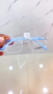 This video presents a curated look at MedFrame Eye Wear's latest collection of trendy frames. It features a series of stylish glasses with transparent lenses and brightly colored temples, including light blue, pink, purple, and yellow. Each pair is displayed individually against a modern, white marble background, highlighting their unique design and brand details like the 'Spider' logo. by @medframe with Original Sound by Contains: Arabic Soul - Mehdi Yakin & Anas Otman