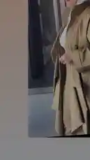 A close-up showcase of a stylish camel-colored coat from Artal Fashion, highlighting its modern design and elegant drape. This look is perfect for those seeking minimalist outerwear inspiration. by @artal.street with original sound