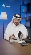 A man in traditional attire unboxes and reviews a Qable Power Delivery cable, demonstrating its fast charging capabilities and magnetic attachment feature. by @qable_qa with Original Sound by qable_qa