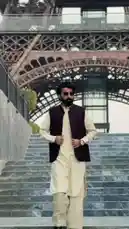 This stylish walk features Moazzam Ishaq confidently striding down stone steps in front of the iconic Eiffel Tower. Dressed in a traditional cream kurta paired with a modern maroon waistcoat and aviator sunglasses, he showcases a unique blend of cultural heritage and contemporary fashion. The sequence captures his poised demeanor and the grandeur of the Parisian landmark, creating a visually compelling narrative. by @moazzam with Original Sound by Contains: Parindey (From "Jatt Nuu Chudail Takri") - B Praak, Avvy Sra & Harmanjeet