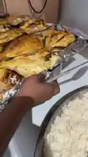 Watch as seasoned whole fish are expertly grilled to golden perfection, served alongside fluffy rice and a rich, aromatic curry sauce. This culinary preparation showcases a delicious meal ready to be enjoyed. by @alafasy81 with Original Sound by alafasy81