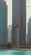 Experience the pride of the United Arab Emirates through stunning visuals. This video captures the national flag waving proudly against iconic backdrops like the Burj Khalifa and Dubai Marina. It features citizens, including children in traditional attire, celebrating their heritage. The scenes transition from serene waterfront views to vibrant cityscapes, culminating in a spectacular aerial display by the UAE Air Force aerobatic team. The 'PROUD OF UAE' logo and Arabic text overlay reinforce the patriotic theme, showcasing a nation's unity and modern achievements. by @reefdevelopment with Original Sound by reefdevelopment