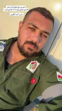 A close-up selfie of a man in a green military uniform, identified as Egyptian, speaking directly to the camera. Arabic text overlays his image, translating to: 'If I am killed, I will be martyred. If I am captured, I will be a prisoner. This is my promise.' His expression is resolute. In the background, a male voice chants a powerful, solemn religious phrase in Arabic, creating a tense and dramatic atmosphere. by @vii35_1 with Original Sound by vii35_1