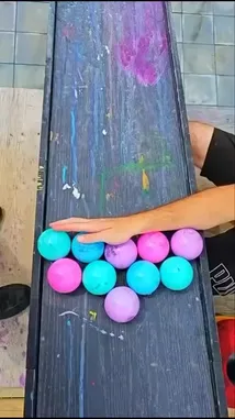 Witness a series of vibrant experiments as colorful balls are launched down a ramp, resulting in spectacular paint explosions upon impact. This creative display combines physics and artistry, showcasing the dynamic reactions of different colored powders against a tiled surface. by @th4eb with Original Sound by th4eb