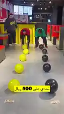 Three men attempt a fun balloon challenge inside a restaurant, but things take a hilarious turn when one man gets stuck under his balloon while doing push-ups. Will they succeed or end up in a comedic pile-up? It's all part of the 'نَاجِي القَاق' entertainment! by @elqaq with Original Sound by elqaq