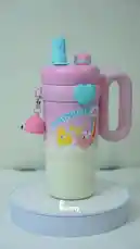 Discover the charming world of Bunny Knocks' collection of kids' water bottles. This video showcases three delightful designs perfect for keeping children hydrated during fun-filled summer days. Watch as each pastel-colored bottle rotates on a display stand, highlighting its unique character-themed artwork, practical features like insulated walls and leak-proof lids, and cute accessories like heart-shaped grips and bell charms. From beach scenes with 'HAPPY' to playful 'RAINBOW' themes, these bottles combine functionality with whimsical design. by @bunnyknocks with Original Sound by bunnyknocks