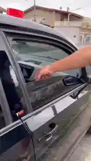 A person demonstrates how to quickly create a reflective emergency triangle using red duct tape on a car window. This simple, do-it-yourself method shows how to prepare a safety sign for roadside emergencies. by @maddi_op with maddi_op by Original Sound