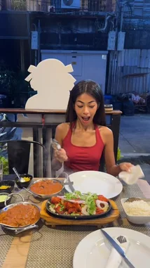Join Tiny Benzy for an authentic Indian dining experience! Watch her enjoy a sizzling platter of tandoori chicken with fresh salad, paired with rich, aromatic curries. This appetizing meal is perfect for anyone looking for delicious food ideas. by @tinybenzy1 with Original Sound by tinybenzy1