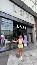 Join fitness influencer Bree Rizzo as she explores the LSKD store, trying on a variety of their signature activewear sets. From vibrant pink sports bras and shorts to sleek lavender leggings and trendy graphic tees, see her full try-on haul. The video captures the shopping experience, including a visit to the fitting room mirror and a look at the brand's holiday gift card campaign. by @breemasters with breemasters by Original Sound