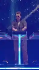 Experience the electrifying atmosphere of Tiesto's live performance at Ultra Music Festival. This high-energy set features a massive stage with dynamic lighting, a large LED screen displaying a majestic eagle, and a sea of fans creating a vibrant party scene. by @tiesto with original sound