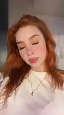 Watch as 🍊mandalinakız🍊 shares her vibrant style in this close-up look. With striking red hair, bold makeup, and a chic white top, she demonstrates a beautiful aesthetic perfect for fashion inspiration. by @merlinblok3 with Original Sound by Contains: Yanayım - Kibariye