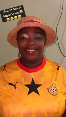 In this lively clip, Bene Sassy, dressed in a vibrant yellow Ghana national football jersey and a stylish straw hat, passionately cheers for her team. She sings and gestures enthusiastically, embodying the spirit of a dedicated fan. Her joyful energy captures the essence of sports fandom. by @be-sassyish with Original Sound by be-sassyish