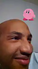 In this short clip, Jack Dorsey is seen laughing heartily while using a popular social media filter that superimposes the character Kirby onto his forehead. The comedic effect of the filter combined with his genuine amusement creates a lighthearted and entertaining moment. by @jackdonnovan with Original Sound by jackdonnovan