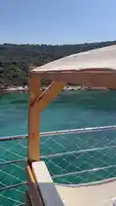Experience a serene boat journey through turquoise waters along a lush, rocky coastline. This scenic cruise offers breathtaking views of the sea and land, perfect for anyone seeking relaxation and natural beauty. by @codedsoso with Original Sound by codedsoso