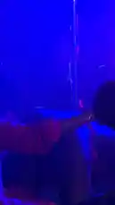 A captivating pole dance performance by Bene Sassy, set against a backdrop of shifting, vibrant lights. The dancer showcases fluid movements and strength, creating an energetic and visually engaging experience. by @be-sassyish with Original Sound by be-sassyish