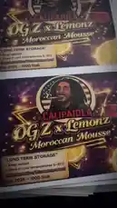 This video provides a close-up look at the packaging for 'OGZ x Lemonz Moroccan Mousse' by Calipaidla. The camera focuses on the vibrant design, which features a prominent image of Bob Marley, American flag motifs, and product details like 'LONG TERM STORAGE'. The creator, PACK'D | DESIGN | PRINT |, showcases the final product of their design and print services. by @pack.d with original sound