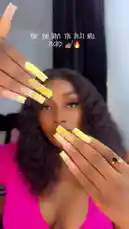 In this captivating short video, creator Ebikayla proudly displays her impressive long, coffin-shaped nails featuring a beautiful yellow gradient design. She poses confidently, showing off the intricate details and flawless application from multiple angles. The video captures the elegance and artistry of modern nail fashion, making it a perfect source of inspiration for anyone interested in bold and trendy manicures. by @ebikala with ebikala by Original Sound