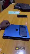 In this quick tech tip from Frekas Global, see how to repurpose your iPhone as a protective case for your Apple Pencil. A hand demonstrates placing the pencil onto the back of a blue iPad Pro, showcasing a simple and clever storage hack. This practical solution is ideal for users looking to keep their accessories organized and protected. by @frekasglobal with Tonight by Nonso Amadi