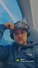 This short clip features AUSTIN SOUND GROUP© youngLA in a relaxed moment inside a vehicle, wearing a cap and headphones while listening to music. The scene captures a personal, candid atmosphere, suggesting a behind-the-scenes look at a creative artist's routine. by @theonlyyoungla with original sound