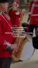 A close-up view of a British Army musician in a vibrant red uniform playing a saxophone during a ceremonial performance. On-screen text highlights their impressive career achievements: 8 years in the Army, 4 promotions, performances at 6 ceremonial events across 5 countries, and participation in 5 different sports. The focus is on military pride, musical talent, and a well-rounded service experience. by @britisharmyhq with Original Sound by britisharmyhq