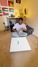 A young man sits on his bedroom floor, holding a water bottle, and predicts the winner of the FIFA World Cup. He rules out teams like Brazil, France, Argentina, and Portugal before dramatically declaring that it's impossible for an Arab nation to win. He then decides to test his luck with Morocco, asking viewers to subscribe to his channel 'BiLiL' if they want to see if he's right. by @bilil01 with Original Sound by bilil01