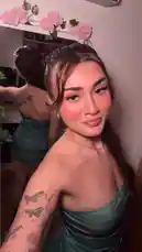 In this captivating clip, Amberrr🫶🏻 takes a mirror selfie, showcasing her elegant green strapless dress and beautiful tattoos. She poses confidently, highlighting her stylish makeup and chic ponytail. The soft lighting and pink floral decorations create a dreamy, intimate atmosphere perfect for fans of fashion and personal style. by @amberrrlaw with original sound